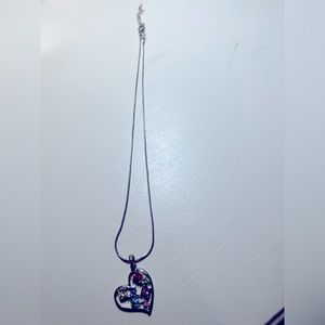 Ladies 16” silver necklace with 2” extender. Heart pendant measures 1”.